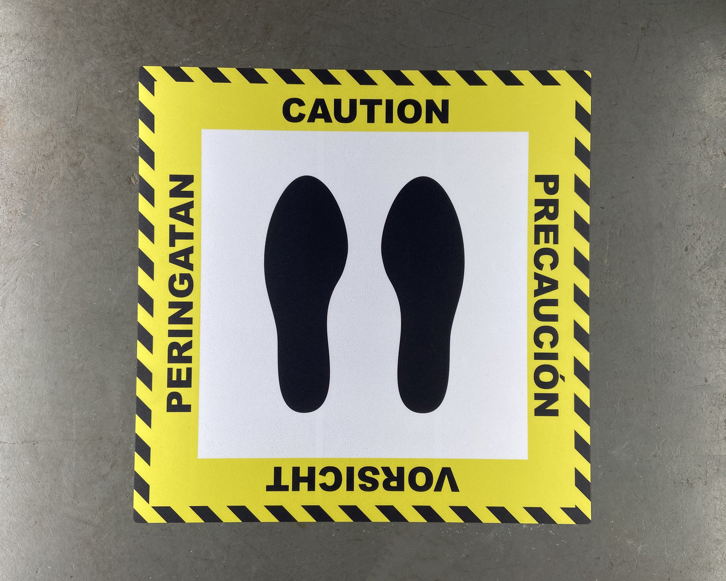 "Caution" Stand Here Multilingual Social Distancing Floor Sign - 22"
